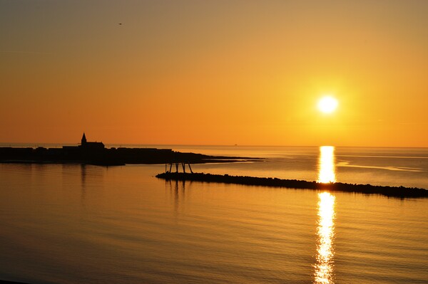 Sunrise in Newbiggin-by-the-Sea Picture Board by Richard Dixon
