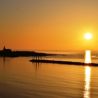Buy canvas prints of Sunrise in Newbiggin-by-the-Sea by Richard Dixon