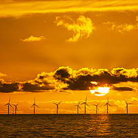 Buy canvas prints of Sunset over the Walney offshore Wind farm by Ashley Cooper
