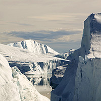 Buy canvas prints of Illulisat icebergs. by Ashley Cooper