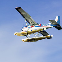 Buy canvas prints of Float plane blue. by Ashley Cooper