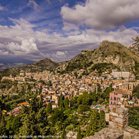 Buy canvas prints of Panoramic view of the city of Taormina from its ancient Greek theater by Mario Koufios