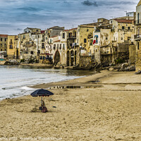 Buy canvas prints of Beach with umbrella in the city of cefalu by Mario Koufios