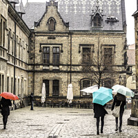 Buy canvas prints of umbrella day in the streets of prague by Mario Koufios