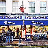 Buy canvas prints of Poppies Fish and Chips Restaurant, Spitalfields by John Chapman