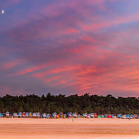 Buy canvas prints of Colourful sunset with moon rising. by Stuart Hill