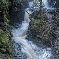 Buy canvas prints of Glenbranter Waterfall In The Rain by Ronnie Reffin