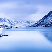 Buy canvas prints of Loch Turret blue hour with snow covered mountains by David Moore