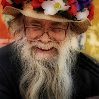 Buy canvas prints of Flower Hat Man by Karen Martin