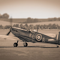 Buy canvas prints of Warming up the spitfire by Lewis Wiffen