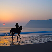 Buy canvas prints of Rider At Dawn, Scarborough  by Alison Chambers