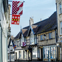 Buy canvas prints of Winchcombe Street Banners by Alison Chambers