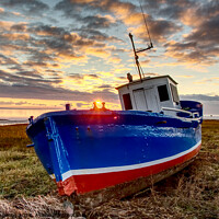 Buy canvas prints of Fishing boat at sunset by Ian Homewood