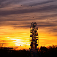 Buy canvas prints of Big Wheel At Sunset by Ian Homewood