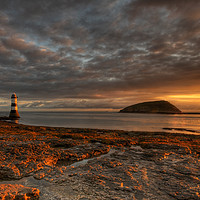 Buy canvas prints of Sunrise at Penmon Point by Ian Homewood
