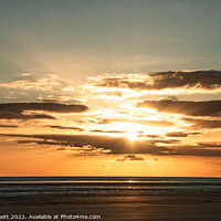 Buy canvas prints of Sunset with  Rays bracking through the cloud at Pembrey Beach Wales by Steve Huggett