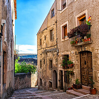 Buy canvas prints of medieval city street with stone buildings by David Galindo