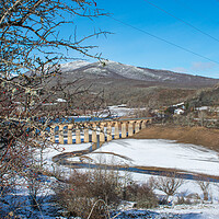 Buy canvas prints of railroad bridge across the snowy valley by David Galindo
