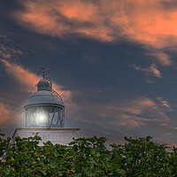 Buy canvas prints of maritime lighthouse lit with sunset sky by David Galindo