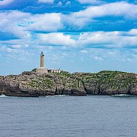 Buy canvas prints of close view of a rock islet in the sea with a lighthouse by David Galindo