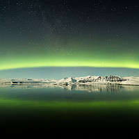 Buy canvas prints of The Northern Lights reflection by Pete Johns