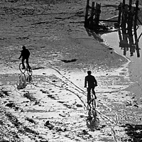 Buy canvas prints of Low-tide Bike-ride by David Mather