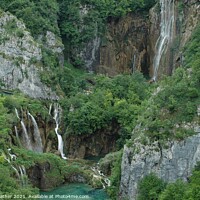 Buy canvas prints of Waterfalls at Plitvicka Lakes, Croatia dwarf the visitors by David Mather