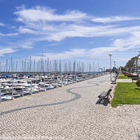 Buy canvas prints of Promenade and Marina Vila Real Algarve by Robert Deering