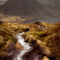 Buy canvas prints of Stormy Tryfan in the Ogwen Valley by Liam Neon