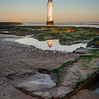 Buy canvas prints of Lighthouse on the Rocks by Liam Neon