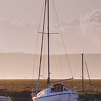 Buy canvas prints of Boat moored at Parkgate Wirral at dusk by Liam Neon