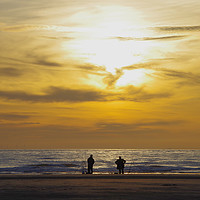 Buy canvas prints of Fishing as the Sun Sets on Hoylake Beach by Liam Neon