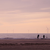 Buy canvas prints of Pulling in the catch as the Sun Sets in Hoylake by Liam Neon