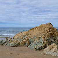 Buy canvas prints of Rock Erupts Through the Sandy Beach, Towyn Farm, W by Liam Neon