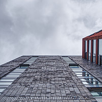 Buy canvas prints of Looking Up The Cargo Building by Liam Neon