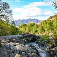 Buy canvas prints of Serene beauty of Ashness Bridge by Aimie Burley