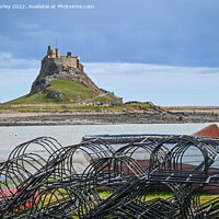Buy canvas prints of Lindisfarne lobster pots  by Aimie Burley
