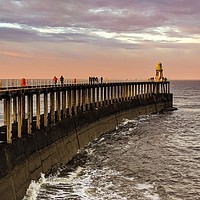 Buy canvas prints of Whitby Pier at Sunset by Aimie Burley