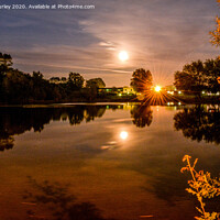 Buy canvas prints of Golden moon over the lake by Aimie Burley