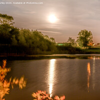 Buy canvas prints of Golden moon over the lake by Aimie Burley