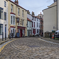 Buy canvas prints of Cobbled Street in Staithes  by Aimie Burley