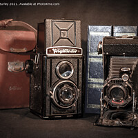Buy canvas prints of A couple of old cameras  by Aimie Burley