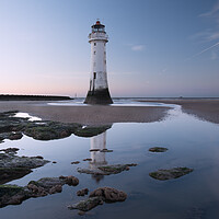 Buy canvas prints of Perch Rock lighthouse reflection by Ann Goodall