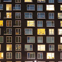 Buy canvas prints of Modern apartment building at dusk by conceptual images