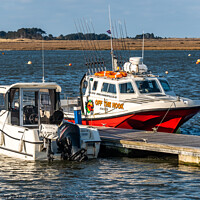 Buy canvas prints of Boats moored in Wells estuary. North Norfolk by Chris Yaxley