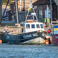 Buy canvas prints of Commercial fishing boats in the port of Wells-Next-The-Sea, North Norfolk by Chris Yaxley