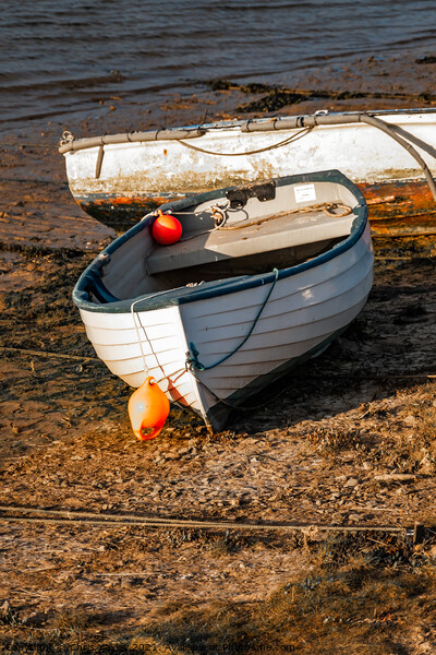 Beached boats in Wells-Next-The-Sea estuary Picture Board by Chris Yaxley