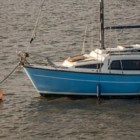 Buy canvas prints of Front end of sailing boat moored in Wells estuary by Chris Yaxley