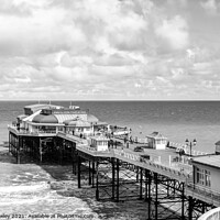 Buy canvas prints of Cromer pier in black and white by Chris Yaxley