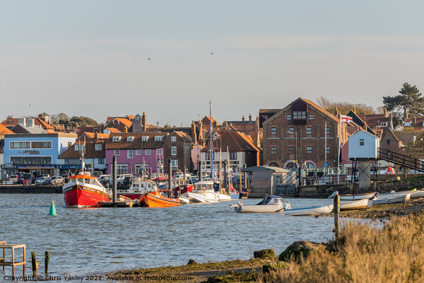A view towards the quayside of the Port of Wells-Next-The-Sea on the North Norfolk coast Picture Board by Chris Yaxley